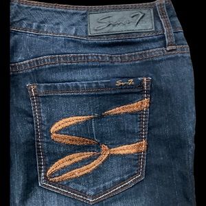 Mid Rise Dark Navy Skinny Jeans.